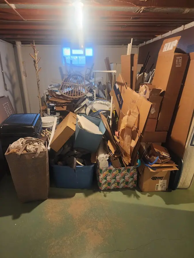 Roll-off dumpster container at job site for Yard Waste Dumpster Rental in Plymouth